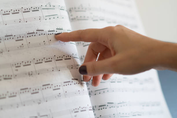 Woman showing Sheet Music